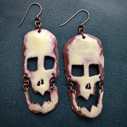 Skull Earrings, torch fired enamel, swinging jaws