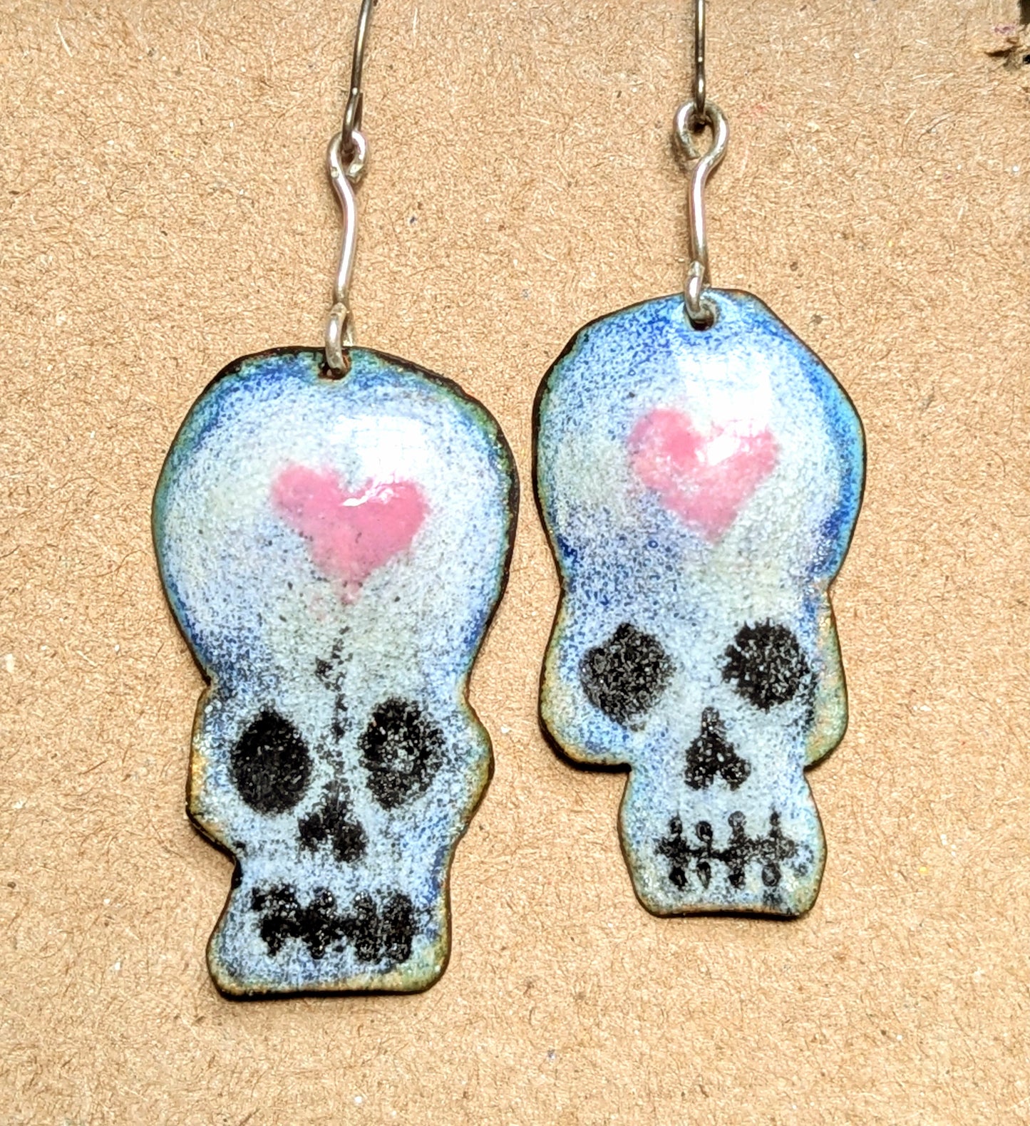 Heart Skulls, because love matters and life is short. Enameled copper.