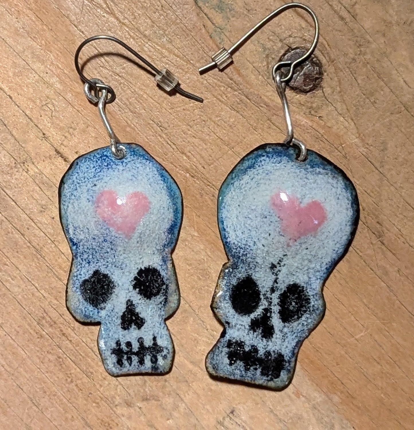 Heart Skulls, because love matters and life is short. Enameled copper.