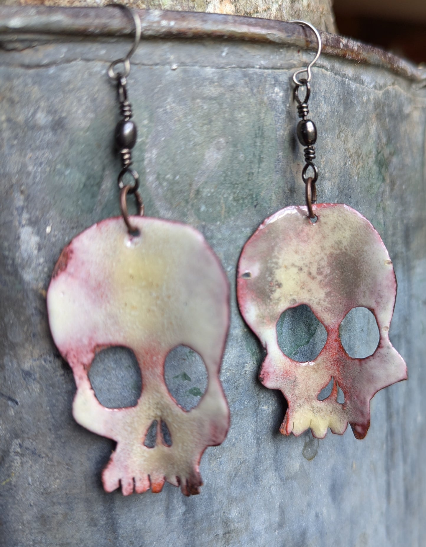 Skull earrings: handmade, rotating, torch fired enamel, one of a kind