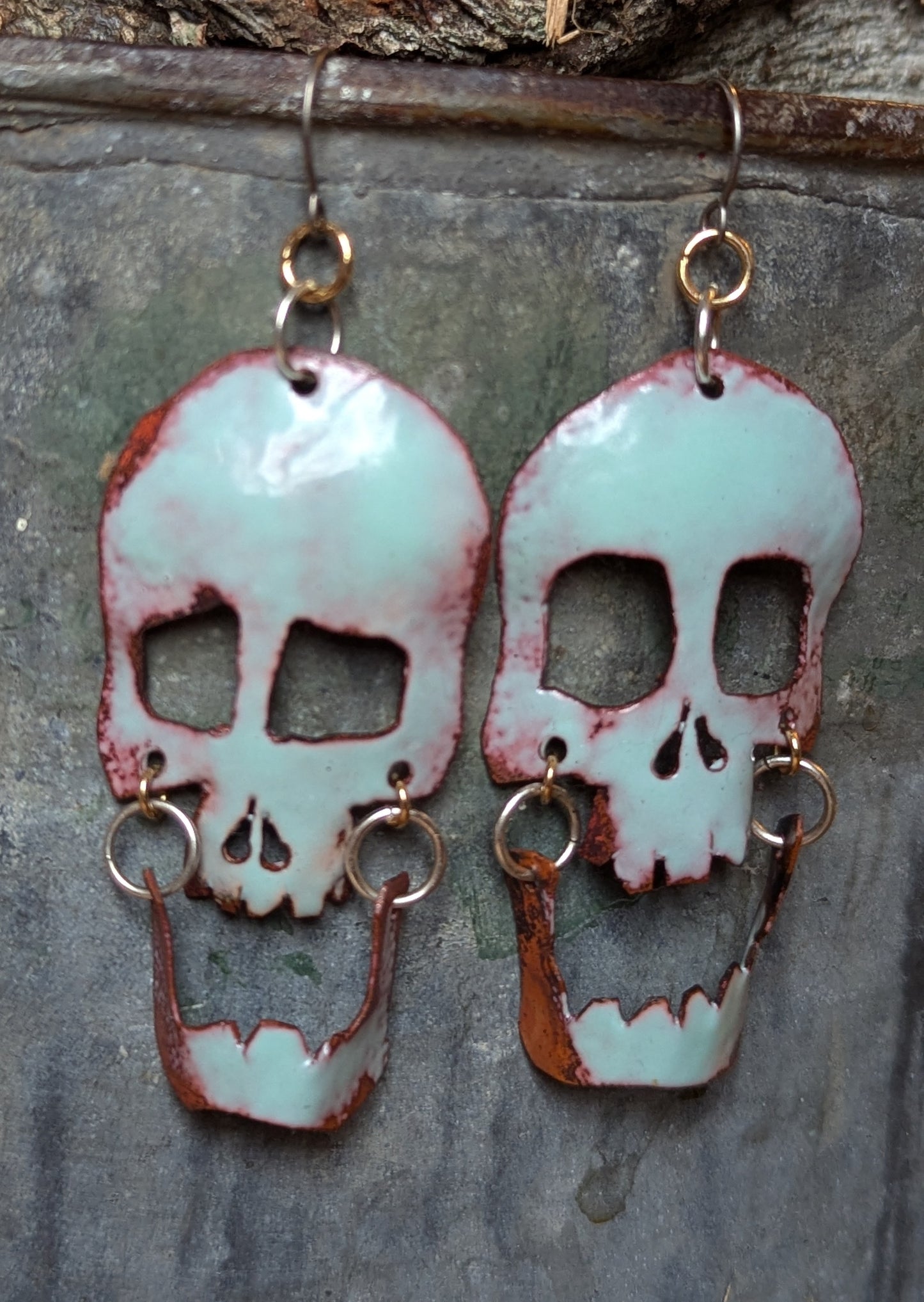 Skull earrings: handmade, torch fired enamel, swinging jaws, one of a kind