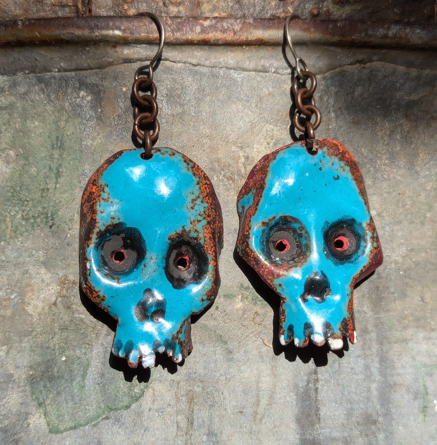 SOLD: Skull earrings, torch fired enamel in ocean blue