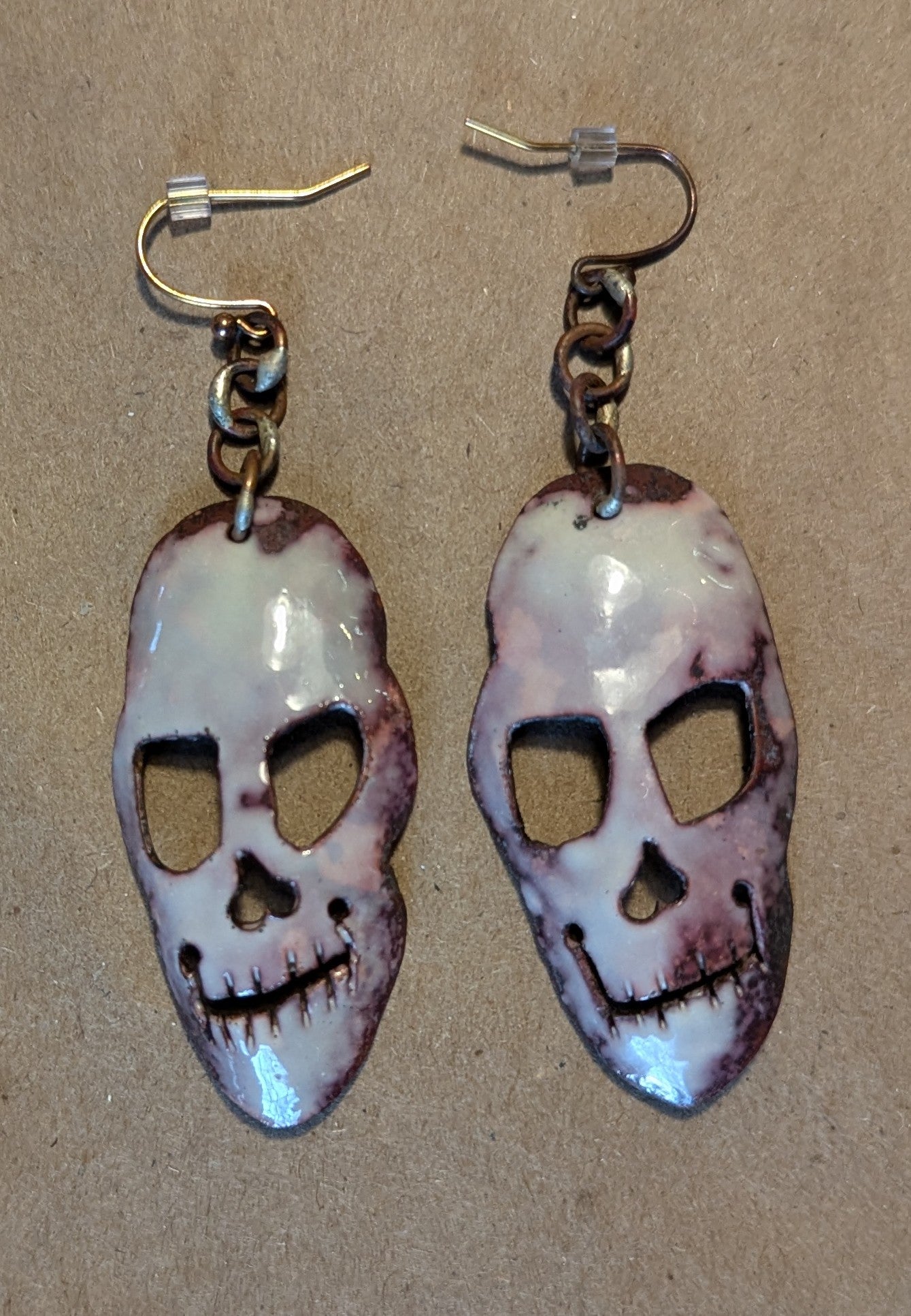 SOLD: Joker skull earrings, torch fired, hand formed enameled copper.