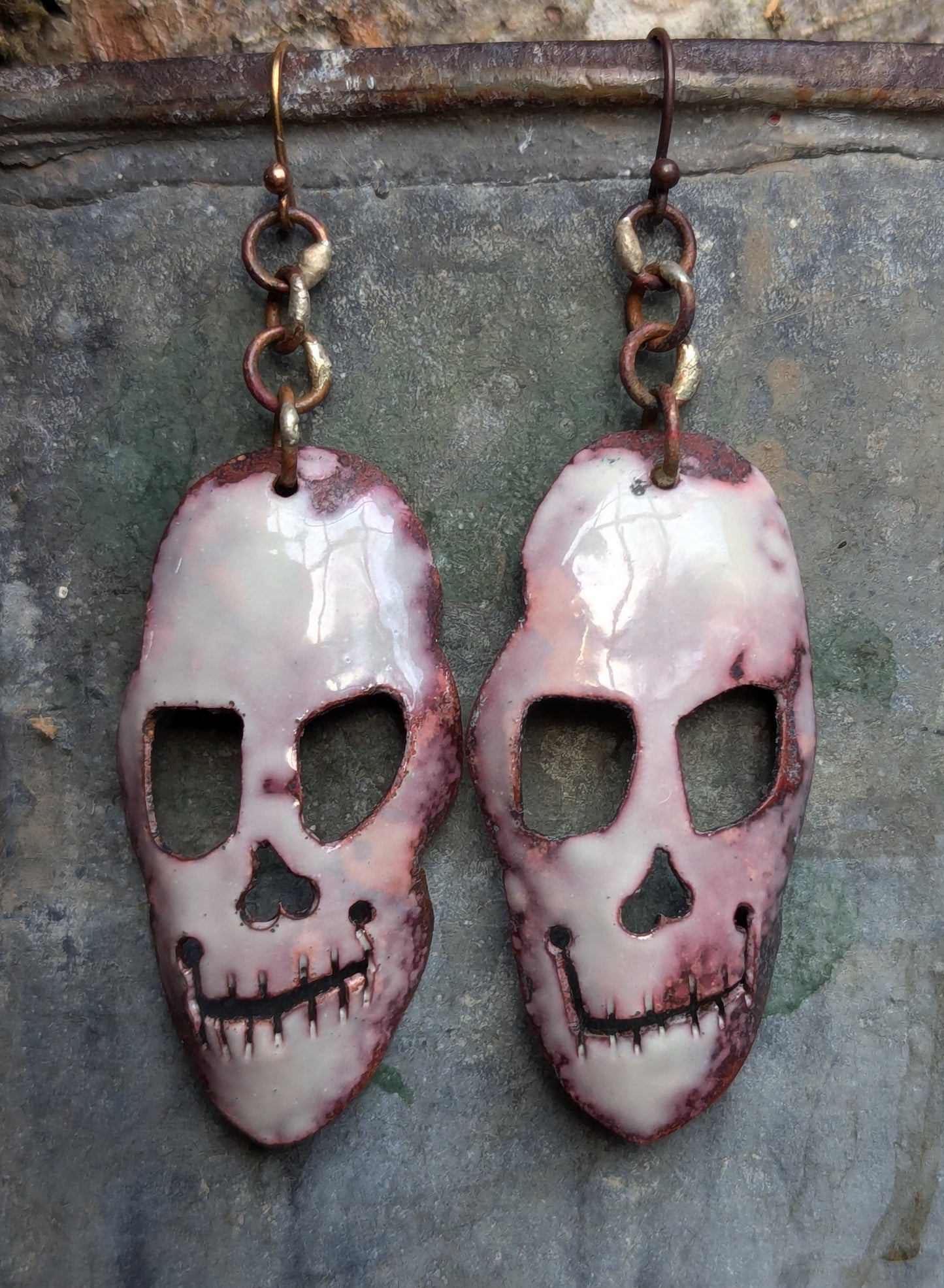 SOLD: Joker skull earrings, torch fired, hand formed enameled copper.