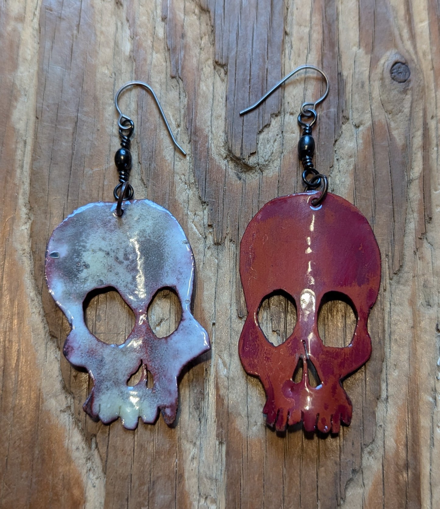 Skull earrings: handmade, rotating, torch fired enamel, one of a kind