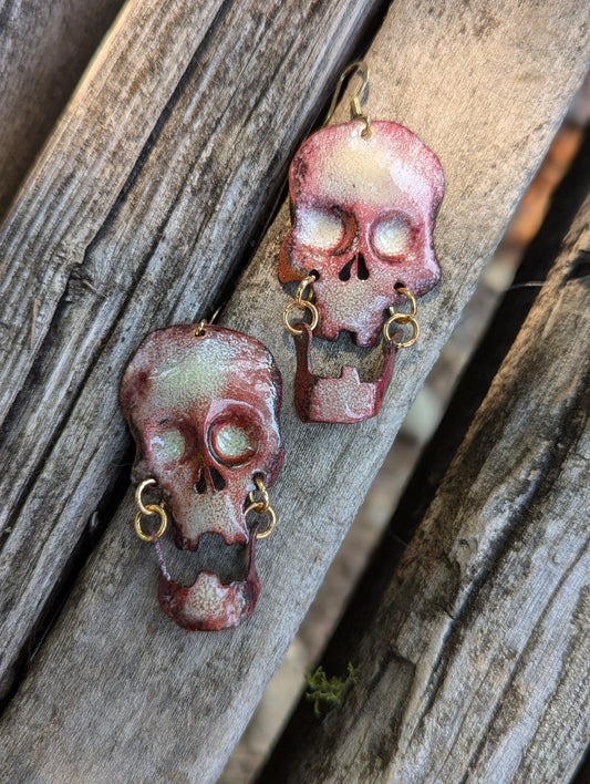 Skull earrings: handmade, torch fired enamel, swinging jaws