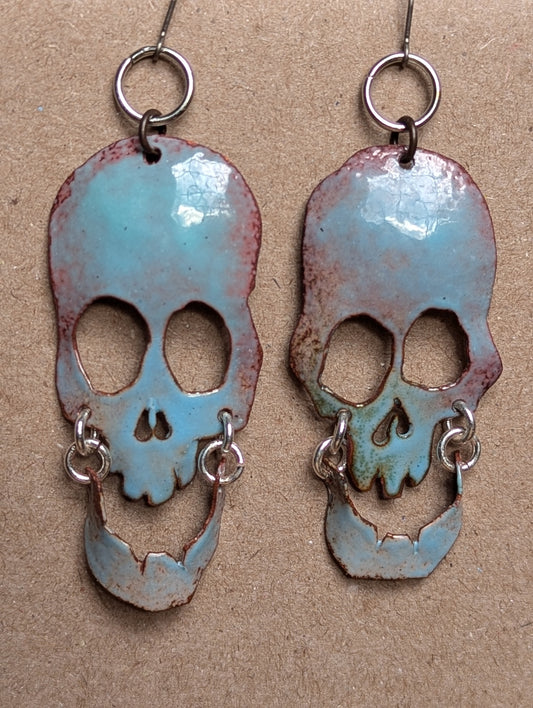 Halo Skully, enameled copper statement earrings with swinging jaws