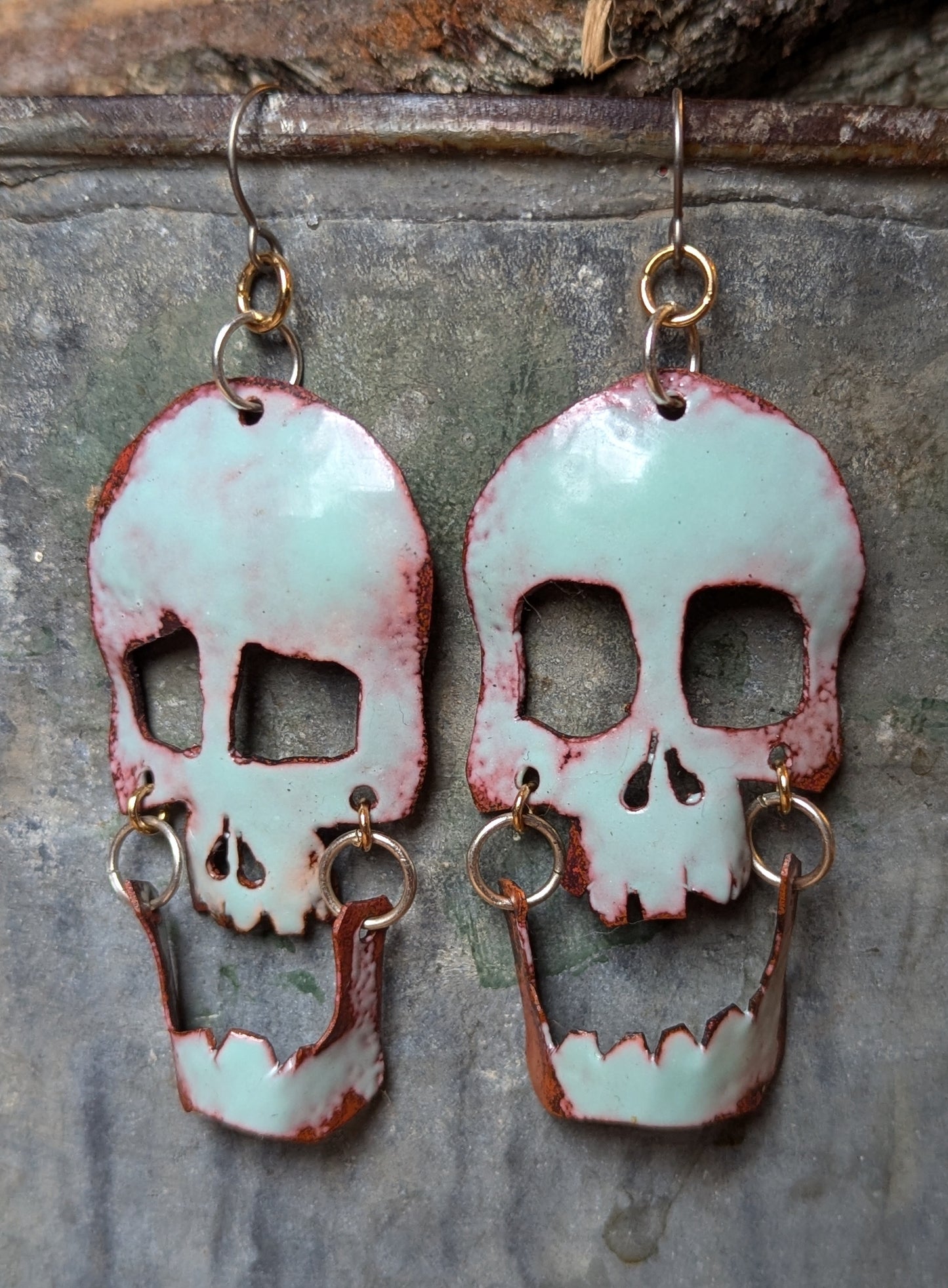 Skull earrings: handmade, torch fired enamel, swinging jaws, one of a kind